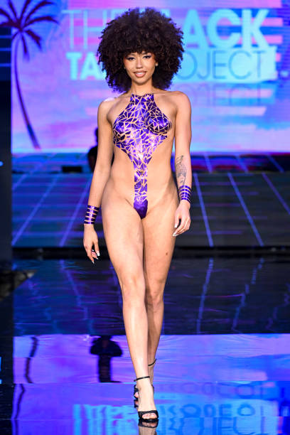 miami-florida-a-model-walks-the-runway-for-the-black-tape-project-fashion-show-during-the.jpg