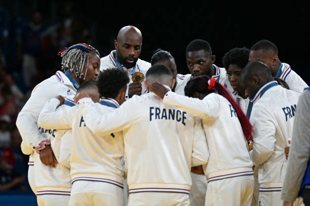 gold-medallists-team-france-pose-for-a-photo-after-the-podium-of-the-judo-mixed-team-event-at.jpg