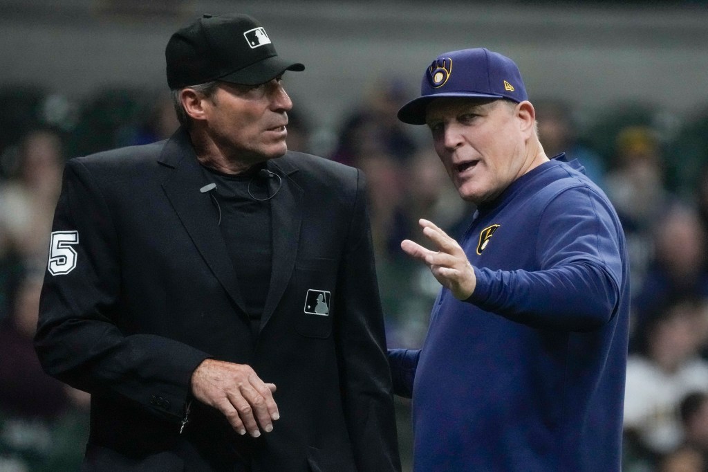 MLB umpire Angel Hernandez (l.), seen here during an argument with Brewers manager Pat Murphy on April 16, 2024, announced his retirement on Monday.