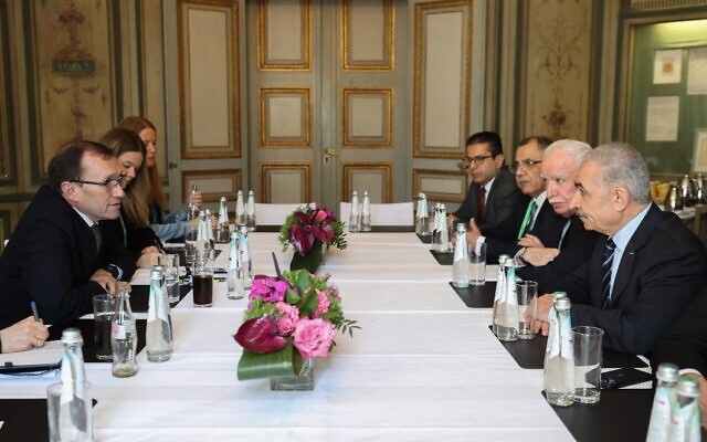 Palestinian Authority Prime Minister Mohammed Shtayyeh meets at the headquarters of the Munich Security Conference with Norwegian Foreign Minister Espen Barth Eide on February 18, 2024. (Wafa)