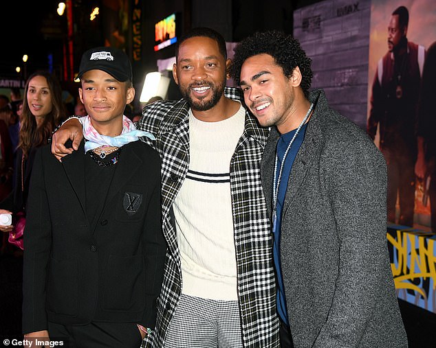 23415268-7888983-His_boys_The_actor_51_hit_the_red_carpet_with_Jaden_21_left_and_-m-35_1579064639750.jpg