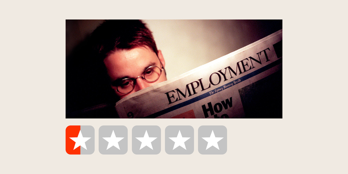 A photo of a person looking at a newspaper employment page above an illustration of five stars with the first half-star filled in.