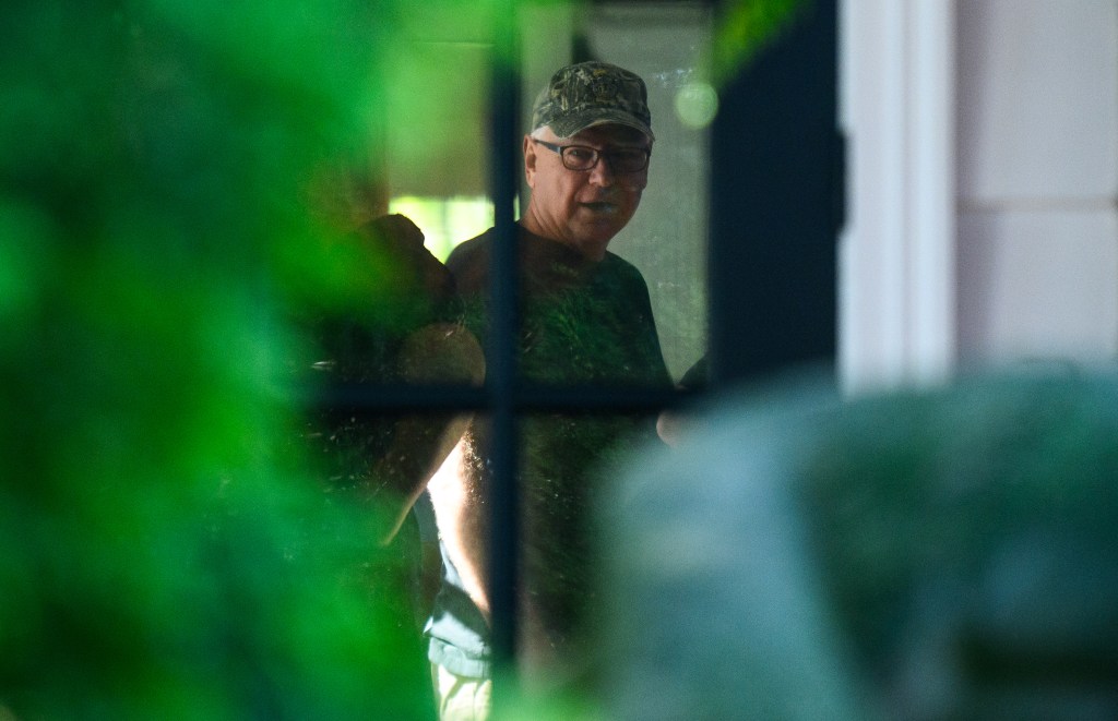 Democratic vice presidential nominee Minnesota Governor Tim Walz preparing to depart from his temporary residence for a campaign rally