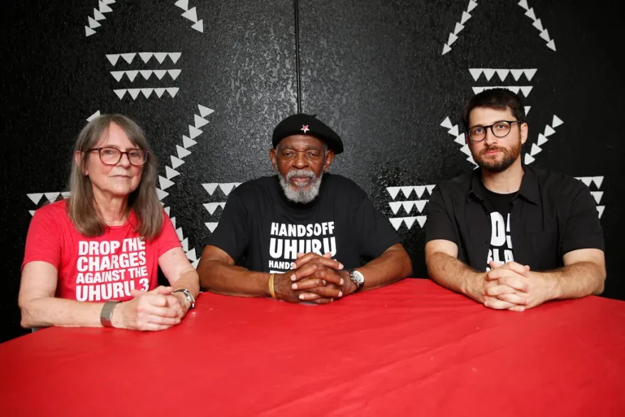 Mr. Yeshitela, center, with fellow defendants Penny Joanne Hess, left, and Jesse Nevel. Each faces a maximum penalty of 10 years in prison.