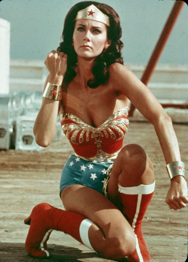 american-actor-lynda-carter-kneels-on-the-ground-and-bears-news-photo-1608157147.