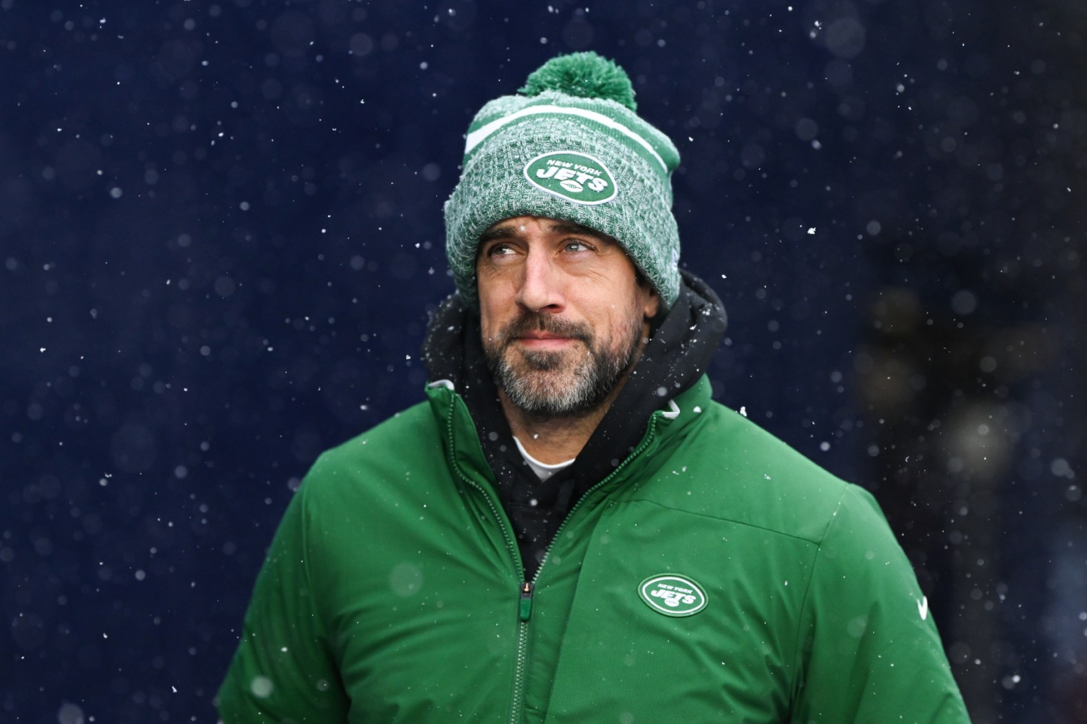 Aaron Rodgers at the start of a New York Jets game against the New England Patriots.