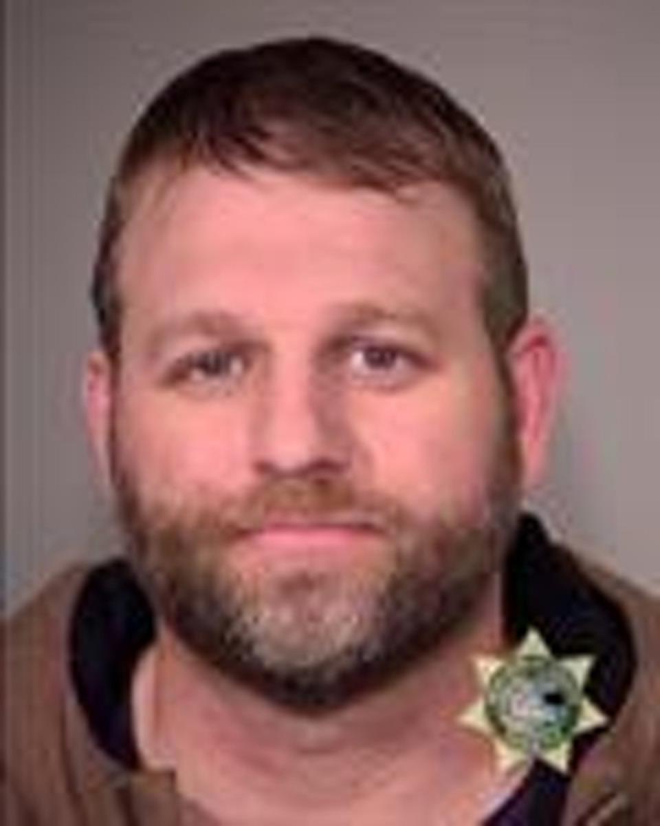 In this handout provided by the Multnomah County Sheriff's Office, suspect Ammon Bundy poses for a mugshot photo after being arrested by U.S. Marshalls January 26, 2016 in Oregon. (Getty)