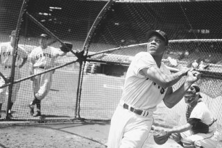 New York Giants' Willie Mays, takes a batting practice swing on June 24, 1954, in New York. Major League Baseball said Tuesday, May 28, 2024, that it has incorporated records for more than 2,300 Negro Leagues players following a three-year research project. Mays was credited with 10 hits for the 1948 Birmingham Black Barons of the Negro American League, raising his total to 3,293. (AP Photo/John Lent)