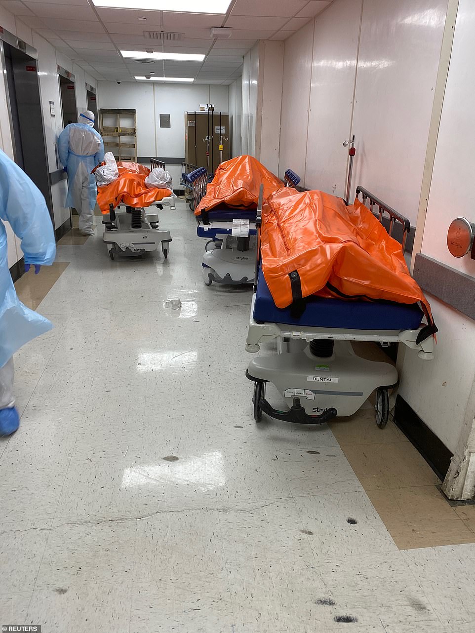 26822954-8188623-Bodies_are_seen_lying_in_corridors_inside_the_Wyckoff_Hospital_a-a-19_1586080459061.jpg