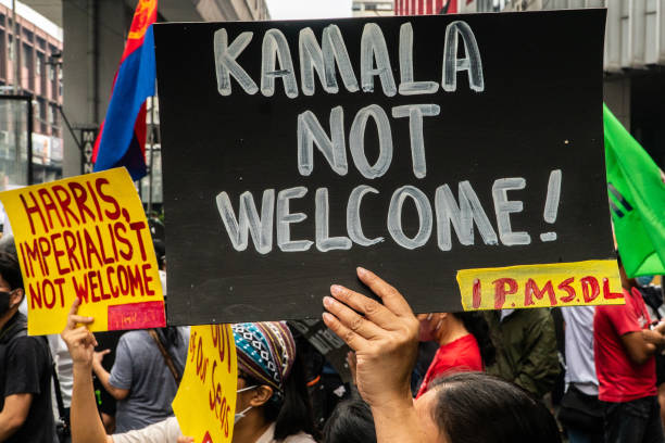 various-militant-groups-carrying-banners-and-placards-hold-a-protest-against-the-visit-of-us.jpg