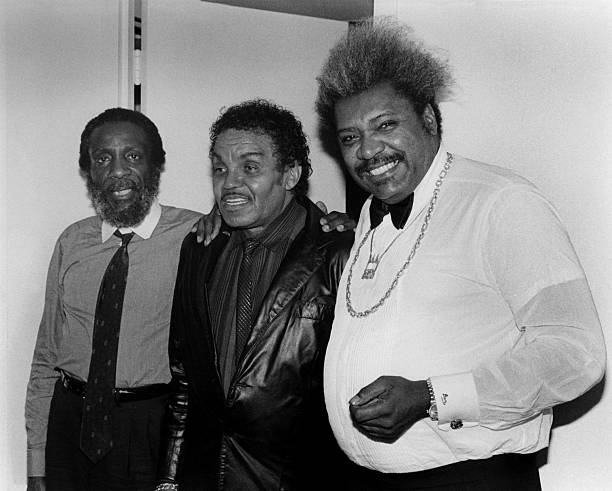 comedian-dick-gregory-joe-jackson-and-boxing-promoter-don-king-poses-for-photos-during-the.jpg