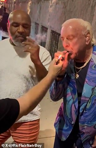 88944929-13781093-Mike_Tyson_and_Ric_Flair_smoke_weed-a-27_1724689064231.jpg