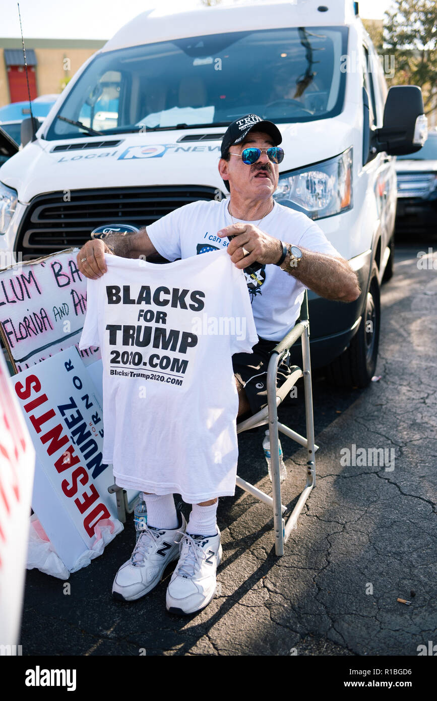 a-protester-seen-holding-a-t-shirt-blacks-for-trump-while-gathering-outside-the-supervisor-of-elections-office-in-broward-county-florida-where-a-recount-is-taking-place-for-the-governor-and-senator-elections-R1BGD6.jpg