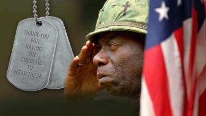 african-american-soldier-salute-flag-veterans-day-2015.jpg