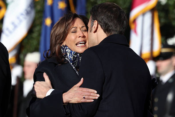 u-s-vice-president-kamala-harris-is-embraced-by-french-president-emmanuel-macron-during-an.jpg