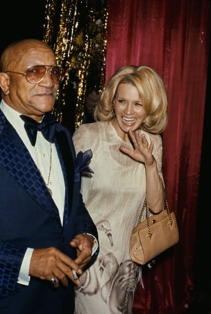 angie-dickinson-and-comedian-redd-foxx-attend-a-red-carpet-event-united-states-circa-1970s.jpg