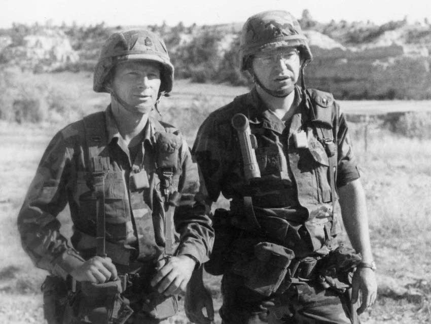 Tim Walz and Gary Bloomberg in military uniforms at Camp Guernsey in 1992, Walz accused of embellishing his military career