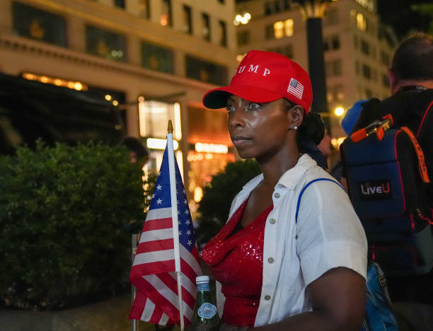 new-york-city-united-states-a-trump-supporter-is-seen-in-front-of-the-trump-tower-after.jpg