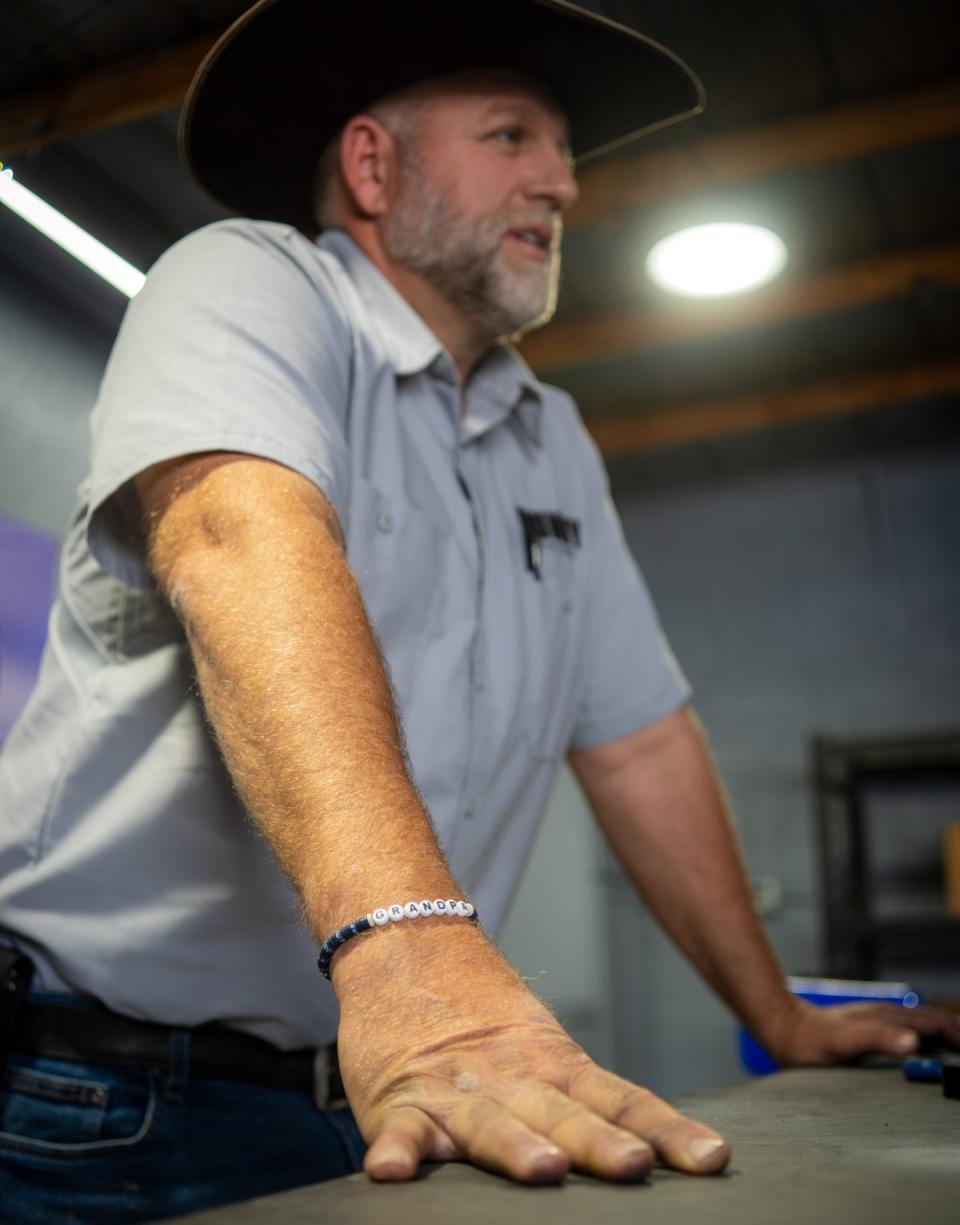 Ammon Bundy wearing a “grandpa” bracelet in October, 2024 (Tom Richell / The Independent)