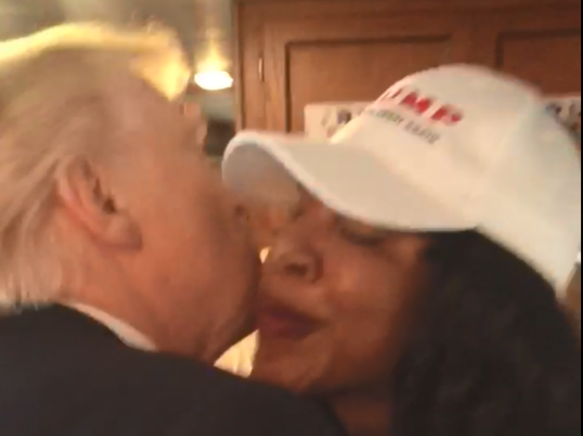 Trump kisses former aide Alva Johnson in video 'proving he violated her  without consent' | The Independent | The Independent