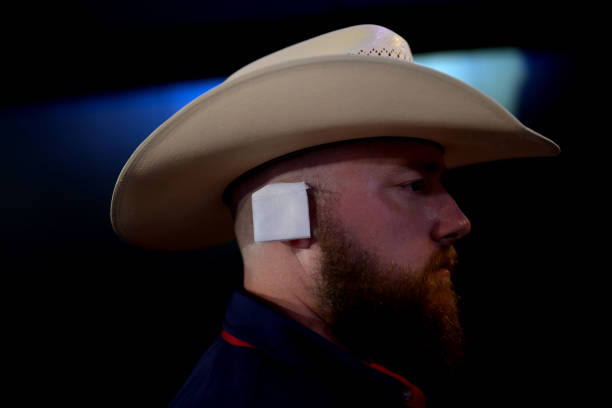 a-delegate-wears-an-imitation-ear-bandage-during-the-republican-national-convention-at-the.jpg