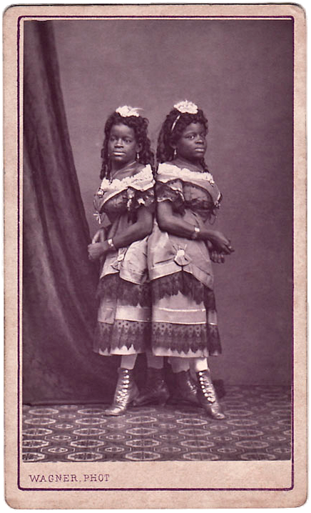 Millie_and_Christine_McKoy_by_Wagner_of_Paris_1870s.png