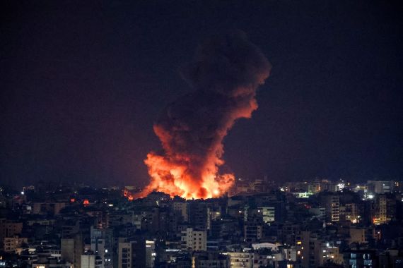 Smoke and flames rise over Beirut's southern suburbs after a strike, amid ongoing hostilities between Hezbollah and Israeli forces, as seen from Sin El Fil, Lebanon, October 6, 2024. REUTERS/Amr Abdallah Dalsh