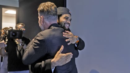 Caleb Williams hugging Matt Eberflus