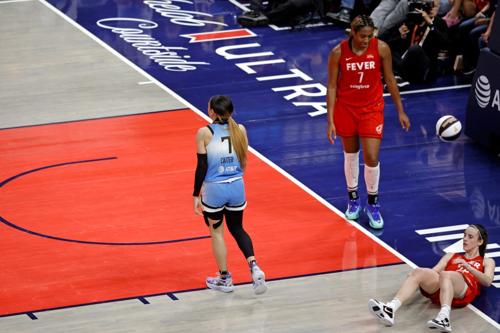 Chennedy Carter is whistled for a flagrant foul for knocking Caitlin Clark to the ground on June 1, 2024, at Gainbridge Fieldhouse in Indianapolis, Indiana.