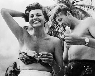 2591-Robert+Mitchum-Rita+Hayworth+1957.jpg