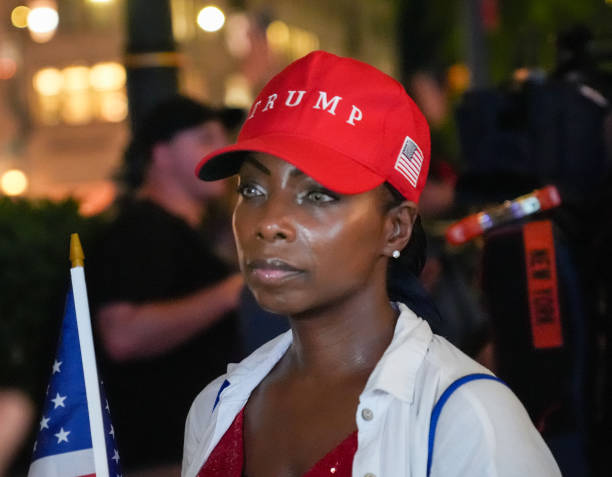 new-york-city-united-states-a-trump-supporter-is-seen-in-front-of-the-trump-tower-after.jpg