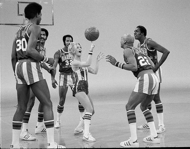 american-actress-goldie-hawn-spins-a-basketball-on-her-finger-while-performing-with-the-harlem.jpg