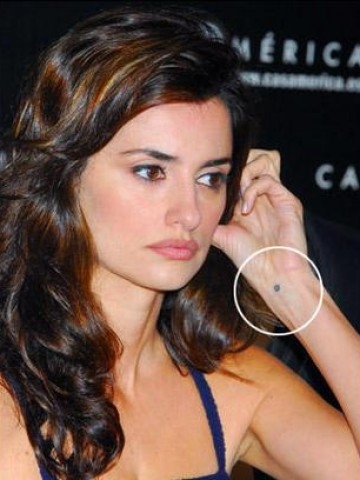 One-Dot-Tattoo-On-Celebrity-Penelope-Cruz-Wrist.jpg