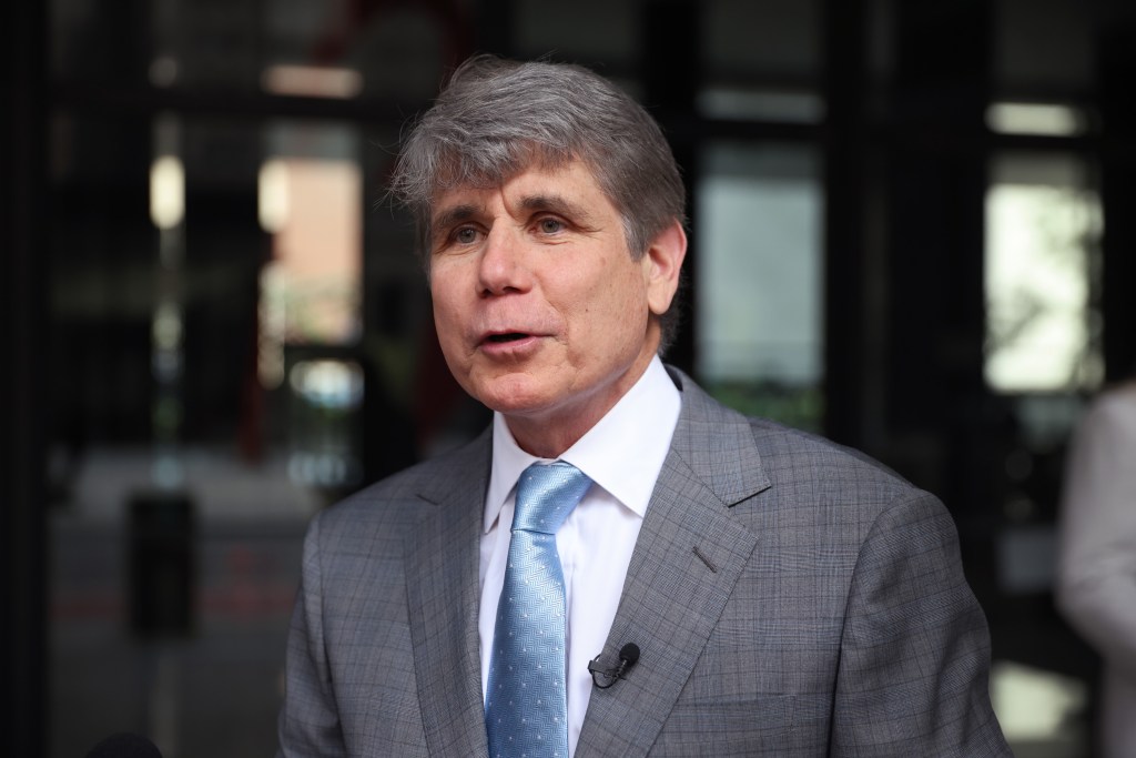 Former Illinois governor Rod Blagojevich speaking to the press outside the Dirksen Federal Courthouse in Chicago, Illinois.