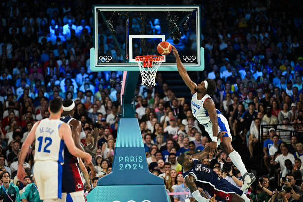 frances-guerschon-yabusele-dunks-the-ball-over-usas-lebron-james-in-the-mens-gold-medal.jpg