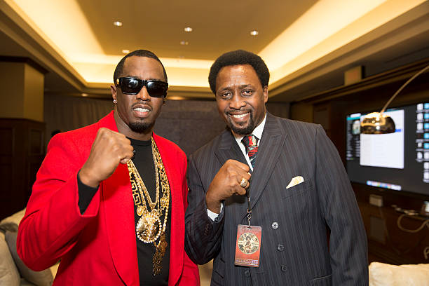 recording-artist-and-entrepreneur-sean-diddy-combs-aka-puff-daddy-and-former-boxer-thomas.jpg