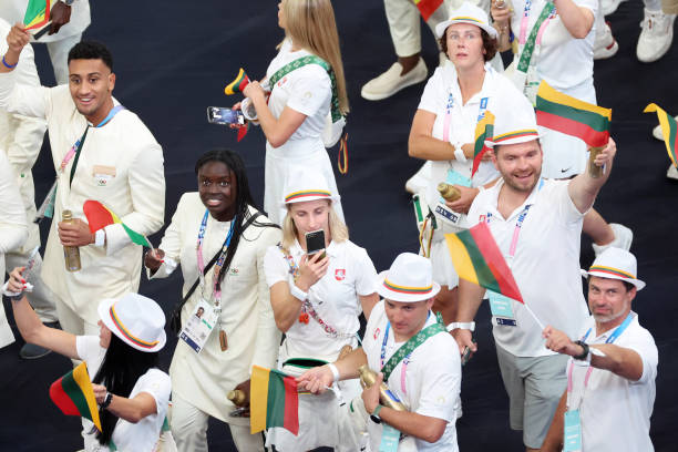 paris-france-athletes-of-team-lithuania-wave-their-nations-flag-during-the-closing-ceremony.jpg