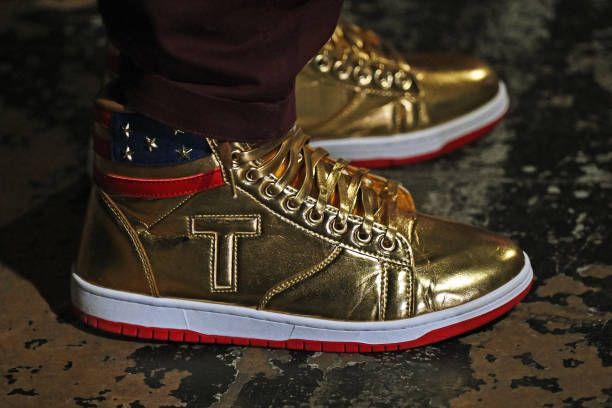 philadelphia-pennsylvania-a-close-up-of-a-supporters-trump-branded-sneakers-as-they-wait-for.jpg