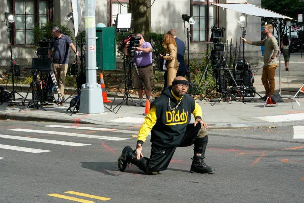 a-supporter-of-rapper-sean-diddy-combs-demonstrates-outside-of-federal-court-during-combs.jpg