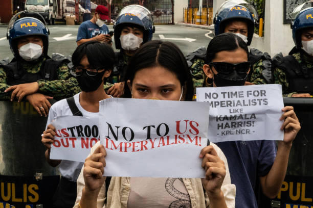 various-militant-groups-carrying-banners-and-placards-hold-a-protest-against-the-visit-of-us.jpg