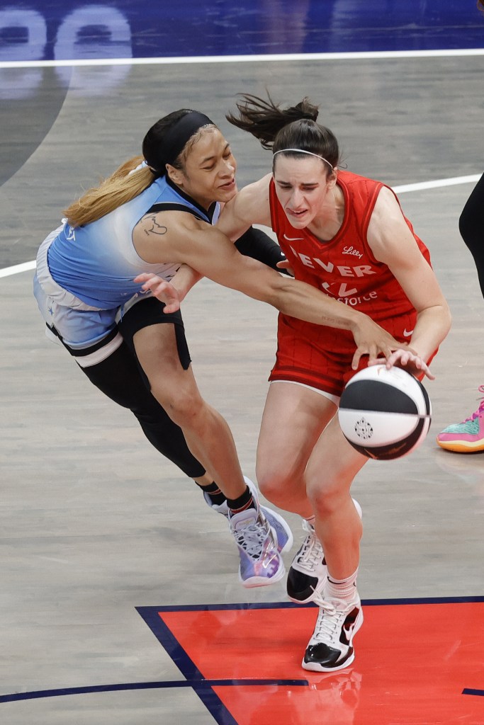 Chennedy Carter guards Caitlin Clark on June 1, 2024, at Gainbridge Fieldhouse in Indianapolis, Indiana. 