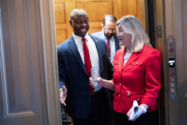 united-states-sens-tim-scott-r-s-c-and-cynthia-lummis-r-wyo-are-seen-during-senate-votes-in.jpg