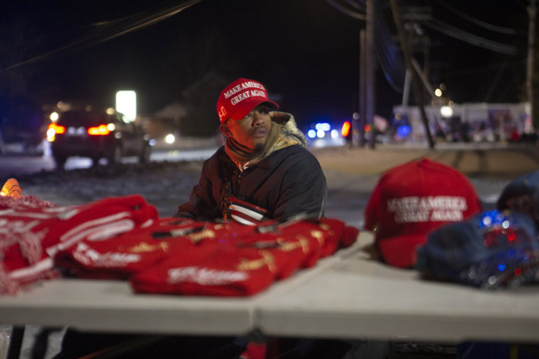 Anthony sells Trump merchandise outside a rally for former President Donald Trump at the Margate Hotel in Laconia, New Hampshire, on Jan. 22, 2024, the eve of the New Hampshire primary.