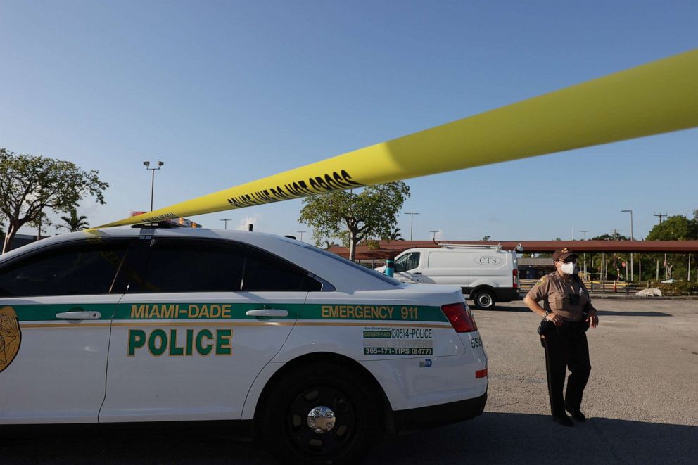 PHOTO: A Miami-Dade police officer stands near where a mass shooting took place outside of a banquet hall on May 30, 2021 in Hialeah, Florida.