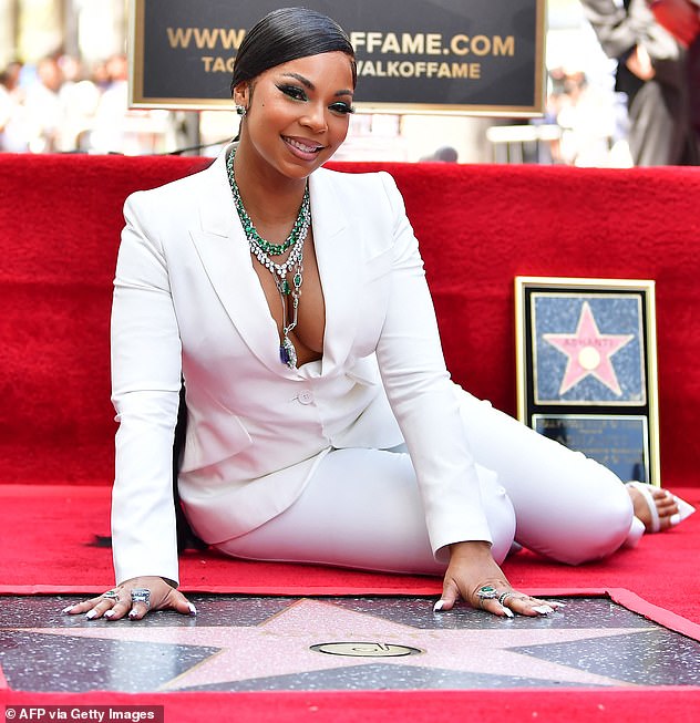 56349613-10979705-A_Star_is_born_Ashanti_now_has_her_own_star_on_the_Hollywood_Wal-a-37_1656920827920.jpg