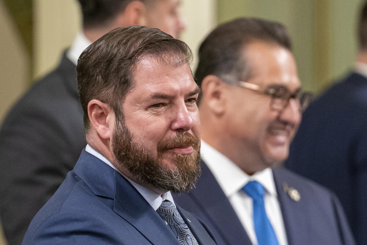 Assemblymember Joaquin Arambula, left, is seen at the Capitol in Sacramento.