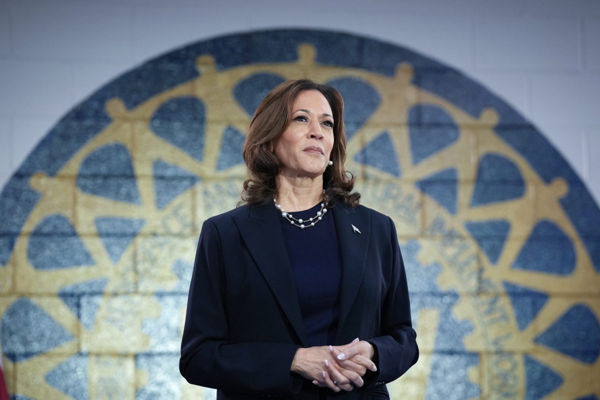 Vice President Kamala Harris waits to speak at a campaign rally at United Auto Workers Local 900 on Aug. 8, 2024, in Wayne, Michigan.