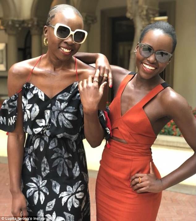 4955BB3100000578-5404891-Double_trouble_Lupita_Nyong_o_sizzled_in_an_orange_dress_while_p-a-57_1518926410283.jpg